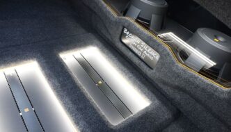 The inside of a trunk with a car audio build